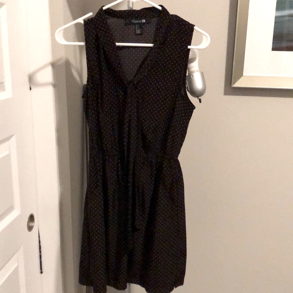 Cute sleeveless black and orange dress with neck tie (or bow)